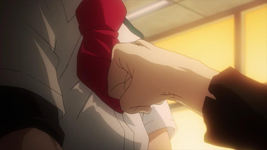 Aizawa punching Deku lightly in the chest