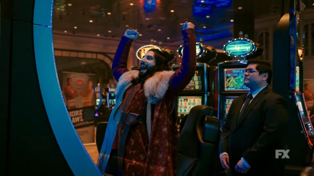 Nandor from what we do in the shadows celebrates his gambling victory in an episode of the show