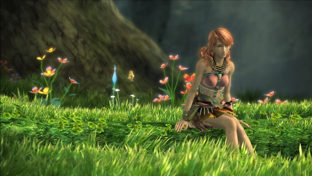 Vanille, a pink haired woman in a short dress, sits on the ground among the grass, flowers behind her, and a yellow chick hovering near her